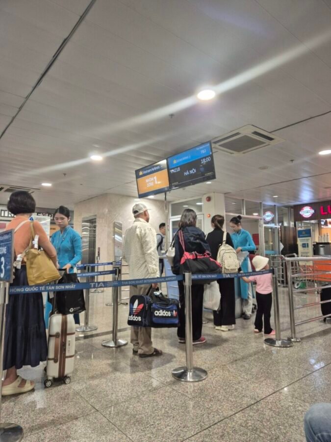 HCMC airport transfer lounge Passengers lining up at Tan Son Nhat International Airport in Ho Chi Minh City