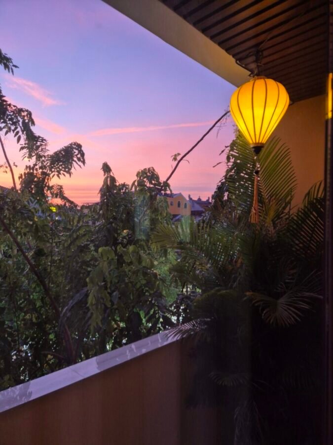 Hoi An evening glow Evening view from a balcony in Hoi An with lantern and sunset sky