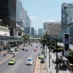 Everyday street scene in Bangkok showing normal daily life and traffic