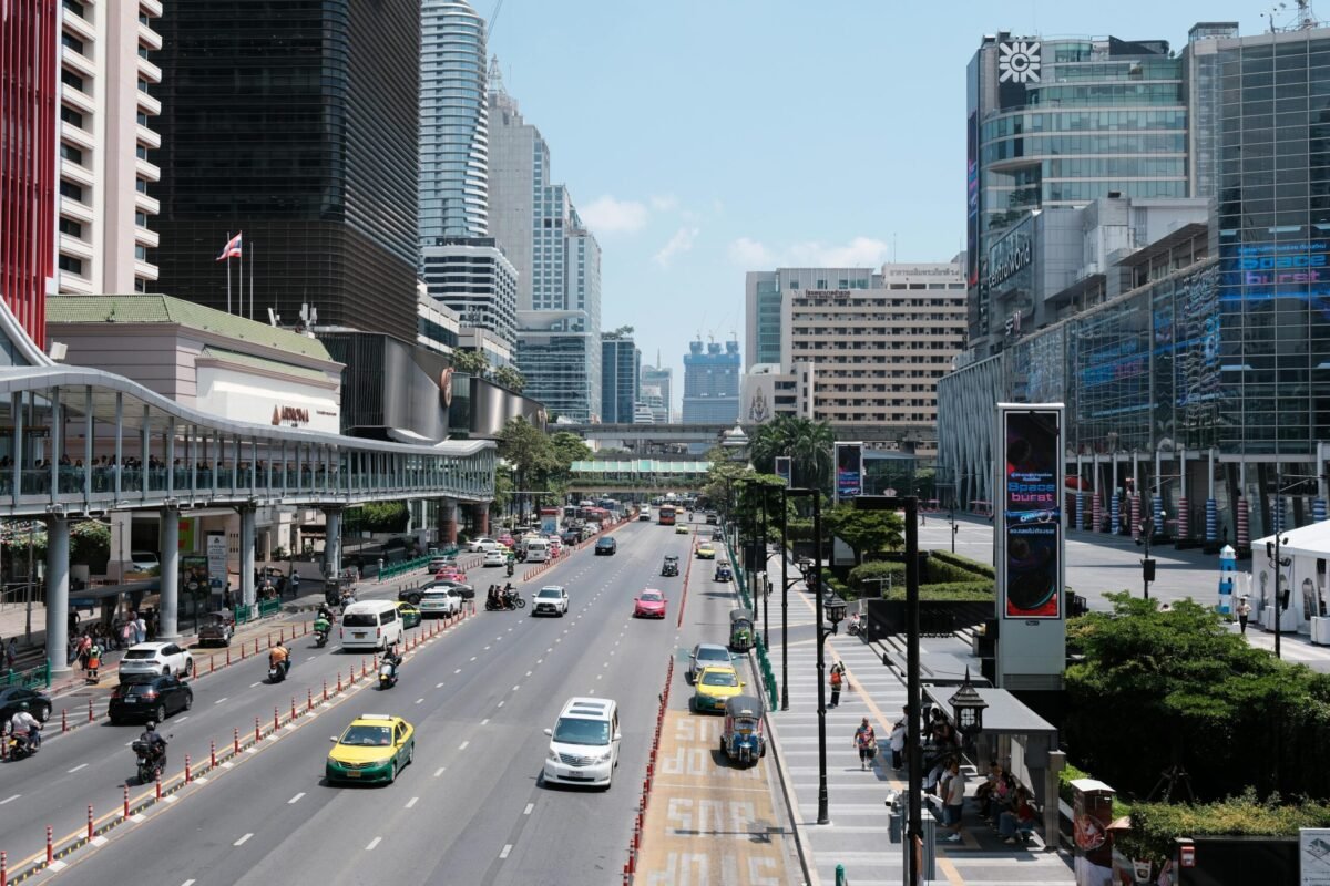 Everyday street scene in Bangkok showing normal daily life and traffic