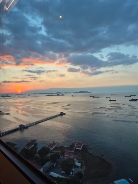 Sri Racha Thailand Quiet coastal scene in Thailand at golden hour with calm light and open space
