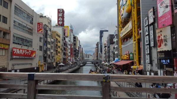 Dōtonbori area in Osaka with canal and illuminated signs