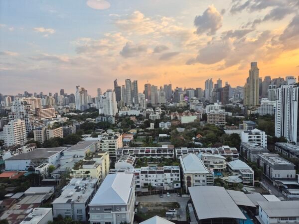 Bangkok skyline at sunset showing dense city living environment