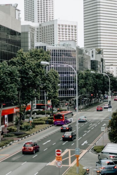 Singapore city street with public buses and organised traffic flow in central business district