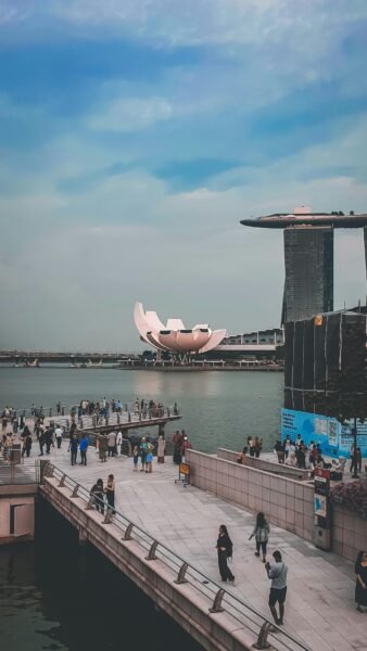Marina Bay skyline Singapore with ArtScience Museum and Marina Bay Sands viewed from waterfront promenade