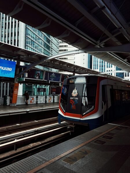 BTS Skytrain at station platform in Bangkok showing modern urban transport system