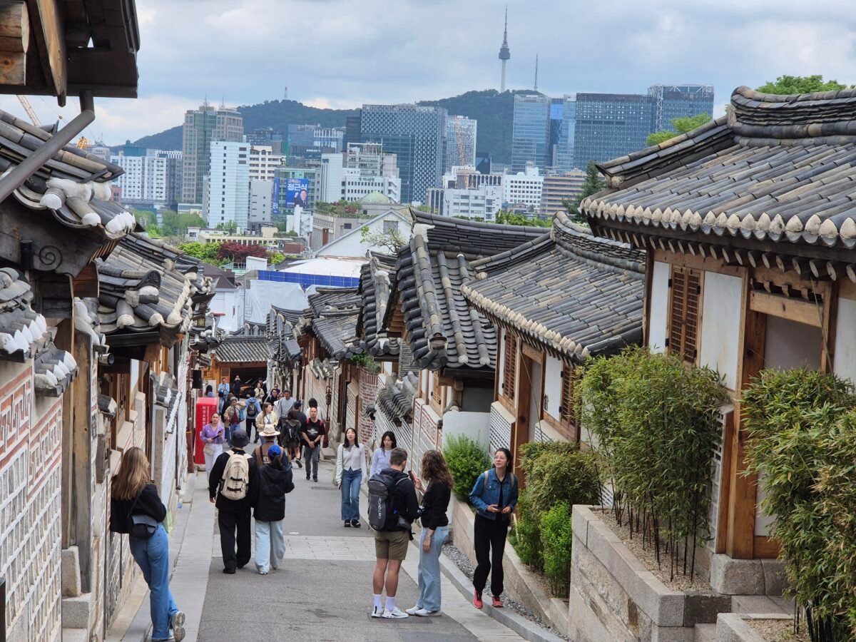 Bukchon Hanok Village, Seoul — the exact viewpoint ChatGPT recommended for this shot, with N Seoul Tower visible in the background