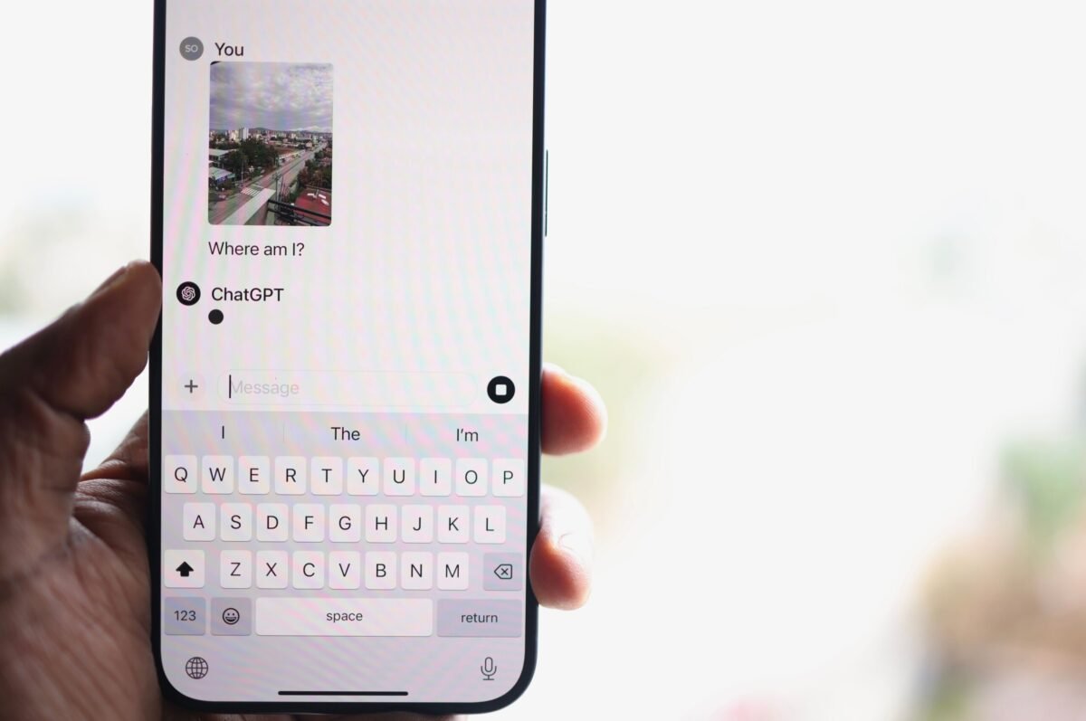 Phone screen showing a photo uploaded to ChatGPT with the question "Where am I?" — the exact method used for real-time navigation and translation while travelling alone