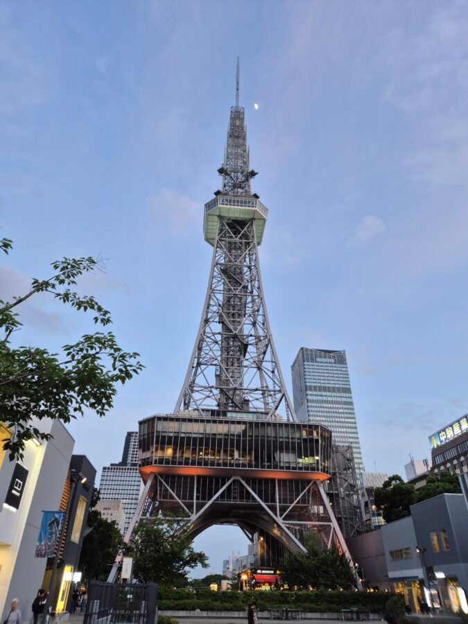 nagoya-tv-tower-mirai-tower-at-dusk-japan Nagoya TV Tower (MIRAI TOWER) illuminated at dusk with the moon above in central Nagoya, Japan.