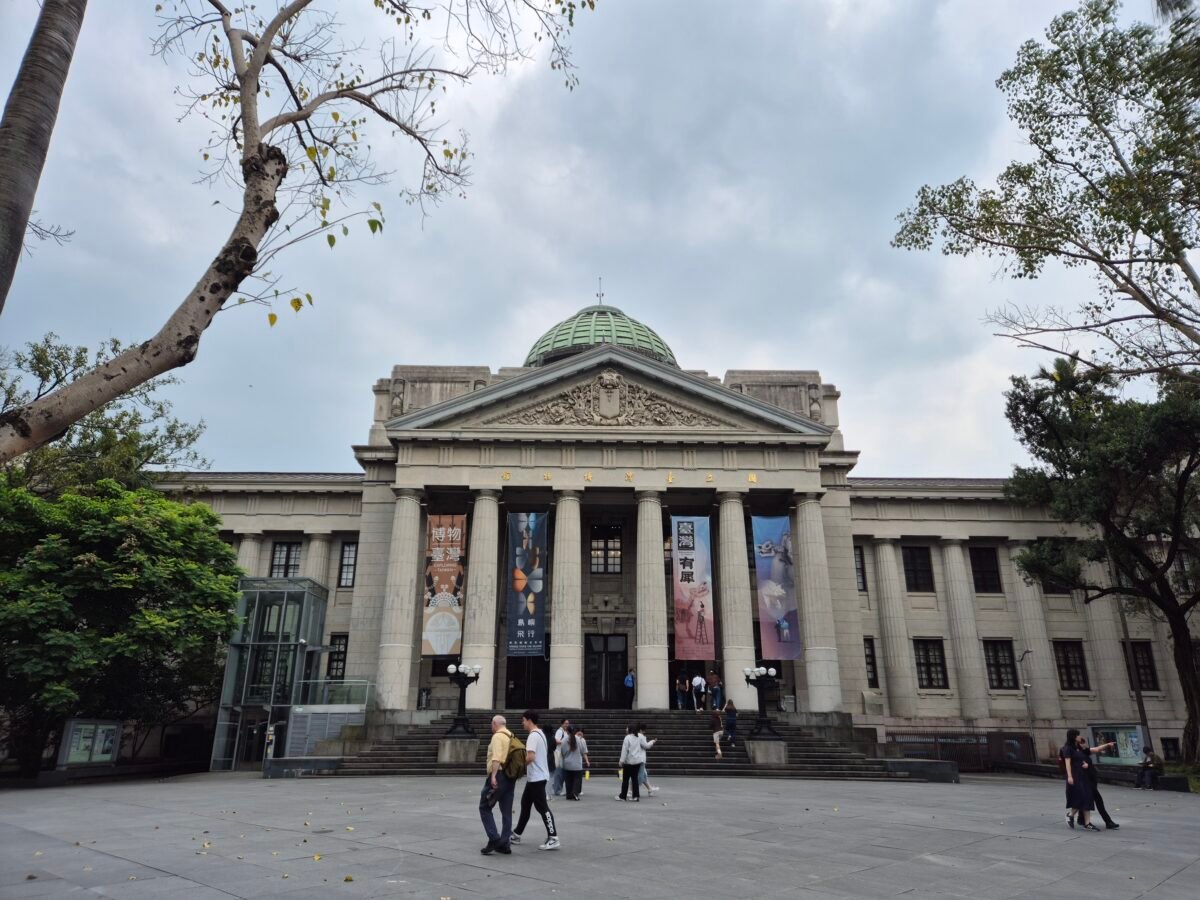 Neoclassical facade of the National Taiwan Museum in Taipei, with Doric columns, a green dome